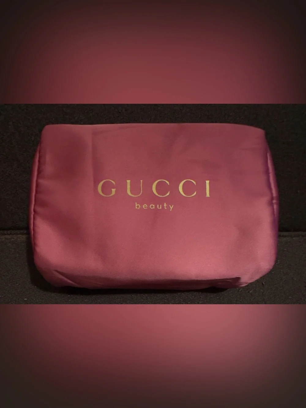 Gucci Pink Satin Beauty Pouch with Gold Logo. 7”W x 6 1/2” H.